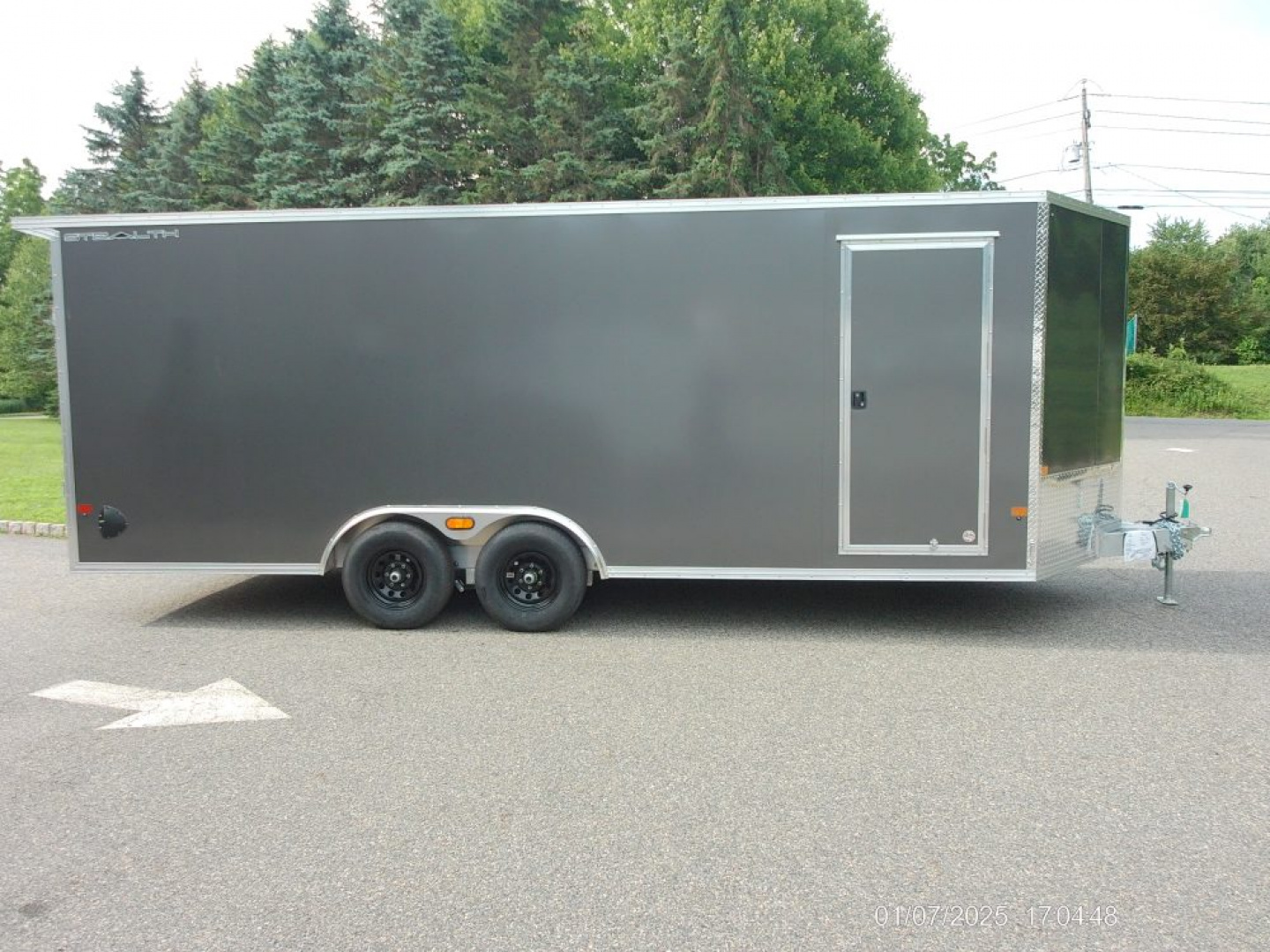 New ALCOM STEALTH CAR TRAILER, 8.5X20 V nose, with options. Finished Interior, Cabinets, 9,990 lb. GVWR, our ID#150954 Sale $22,500