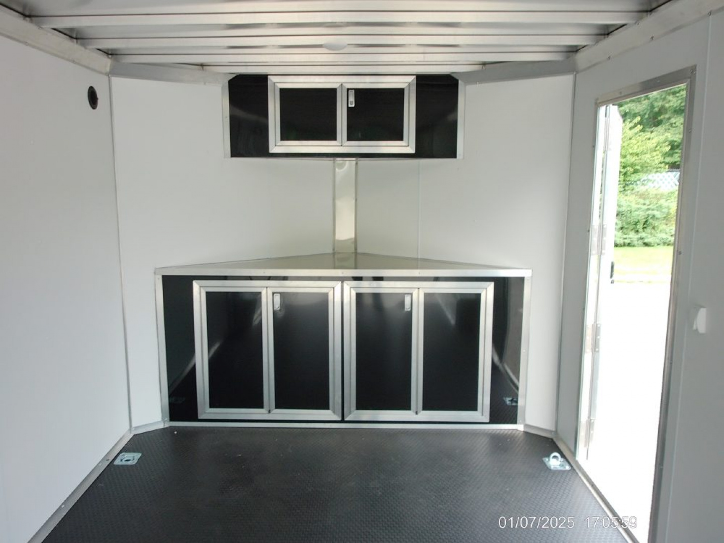 New ALCOM STEALTH CAR TRAILER, 8.5X20 V nose, with options. Finished Interior, Cabinets, 9,990 lb. GVWR, our ID#150954 Sale $22,500