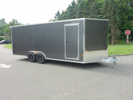 New ALCOM STEALTH CAR TRAILER, 8.5X20 V nose, with options. Finished Interior, Cabinets, 9,990 lb. GVWR, our ID#150954 Sale $22,500