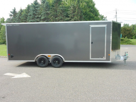 New ALCOM STEALTH CAR TRAILER, 8.5X20 V nose, with options. Finished Interior, Cabinets, 9,990 lb. GVWR, our ID#150954 Sale $22,500