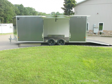 New ALCOM STEALTH CAR TRAILER, 8.5X20 V nose, with options. Finished Interior, Cabinets, 9,990 lb. GVWR, our ID#150954 Sale $22,500