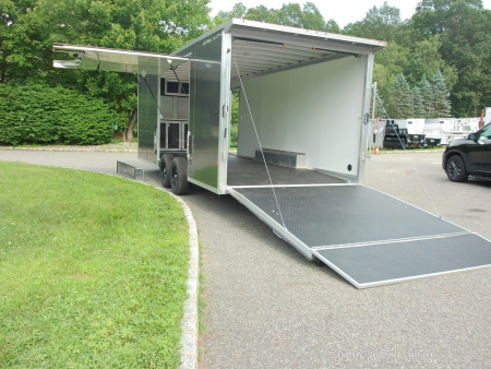 New ALCOM STEALTH CAR TRAILER, 8.5X20 V nose, with options. Finished Interior, Cabinets, 9,990 lb. GVWR, our ID#150954 Sale $22,500