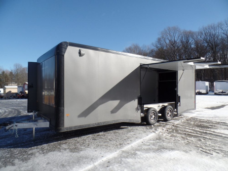 New ALCOM/ STEALTH CAR HAULER 8.5X24 with lots of options, Escape Door, Finished Interior, E track, Cabinets, Electric. ID#155553