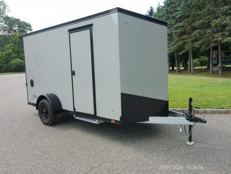 New EXAMPLE / ATC 6X12 with 6'6  interior height, black trim, electric brakes, rear spoiler, battery and lights, step at side door. ID#235268 , $9,695.00