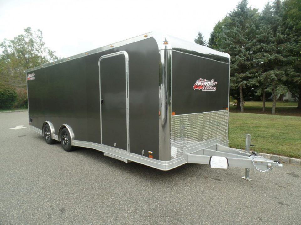 New EXAMPLE / NITRO BRAND 8.5X24 Enclosed Cast Corner Body Style Enclosed Car Trailer, with Options. Big Escape Door, Finished Interior, Cabinets, ID#009489