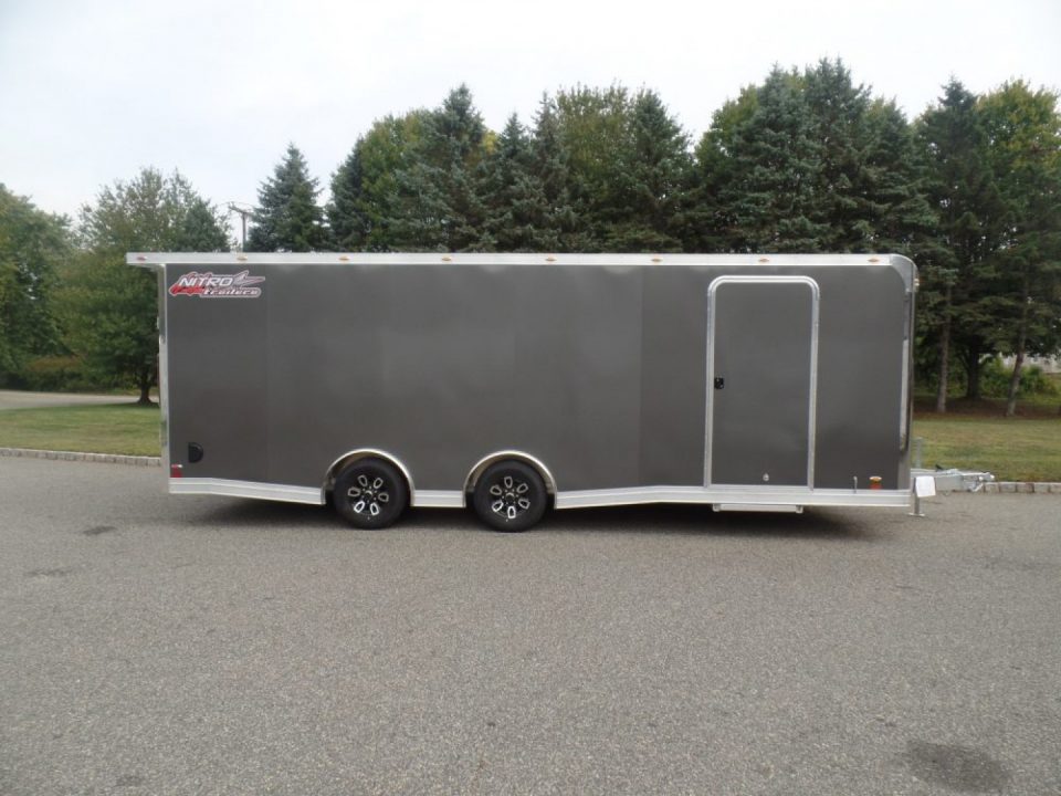 New EXAMPLE / NITRO BRAND 8.5X24 Enclosed Cast Corner Body Style Enclosed Car Trailer, with Options. Big Escape Door, Finished Interior, Cabinets, ID#009489