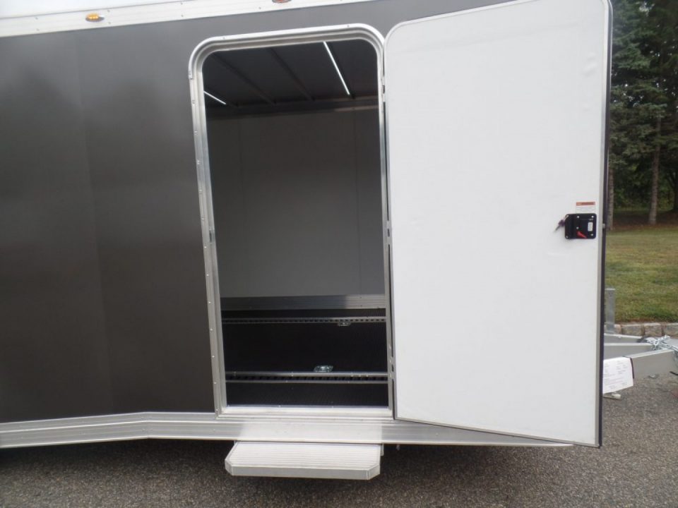 New EXAMPLE / NITRO BRAND 8.5X24 Enclosed Cast Corner Body Style Enclosed Car Trailer, with Options. Big Escape Door, Finished Interior, Cabinets, ID#009489