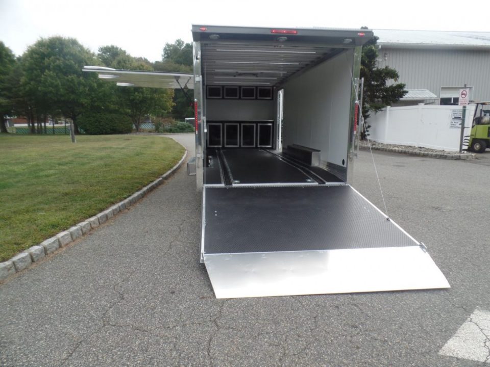 New EXAMPLE / NITRO BRAND 8.5X24 Enclosed Cast Corner Body Style Enclosed Car Trailer, with Options. Big Escape Door, Finished Interior, Cabinets, ID#009489