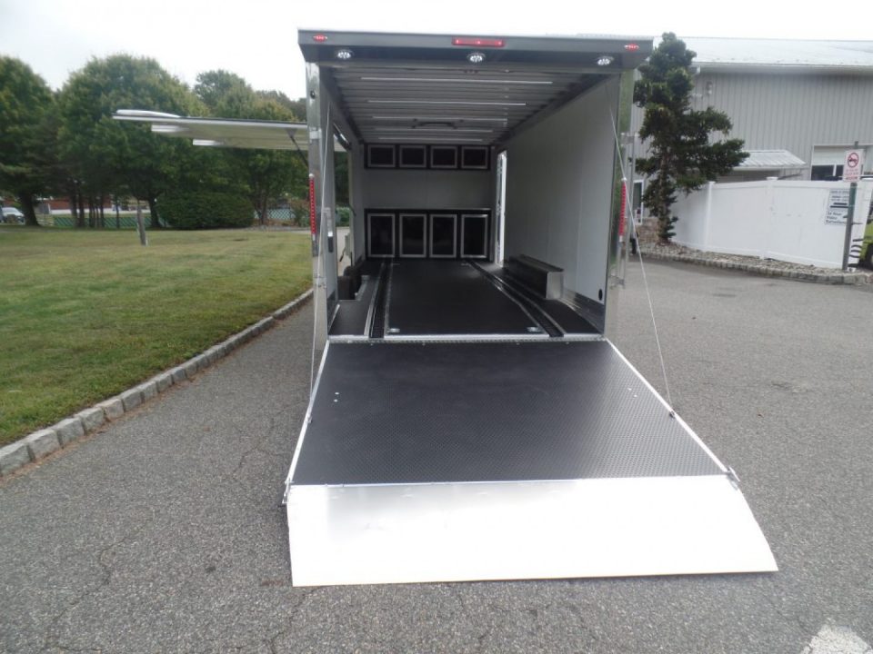 New EXAMPLE / NITRO BRAND 8.5X24 Enclosed Cast Corner Body Style Enclosed Car Trailer, with Options. Big Escape Door, Finished Interior, Cabinets, ID#009489