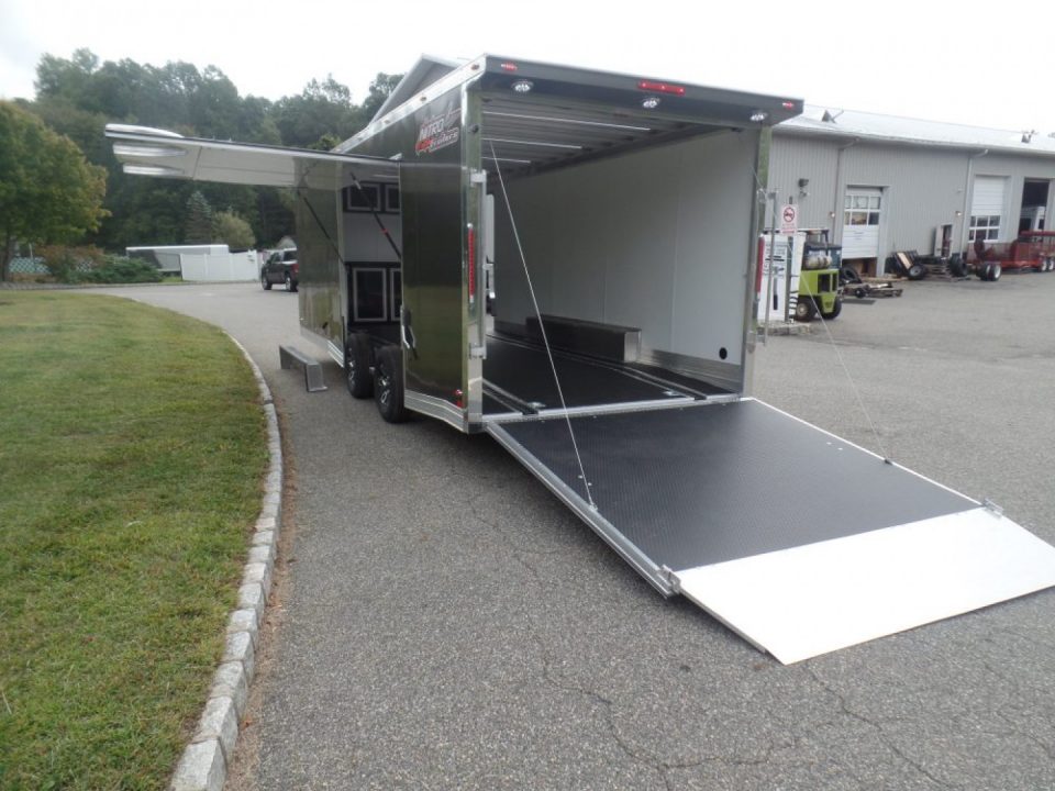 New EXAMPLE / NITRO BRAND 8.5X24 Enclosed Cast Corner Body Style Enclosed Car Trailer, with Options. Big Escape Door, Finished Interior, Cabinets, ID#009489