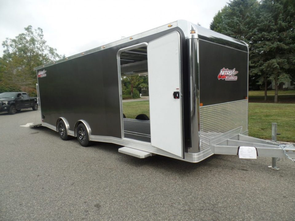 New EXAMPLE / NITRO BRAND 8.5X24 Enclosed Cast Corner Body Style Enclosed Car Trailer, with Options. Big Escape Door, Finished Interior, Cabinets, ID#009489