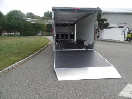 New EXAMPLE / NITRO BRAND 8.5X24 Enclosed Cast Corner Body Style Enclosed Car Trailer, with Options. Big Escape Door, Finished Interior, Cabinets, ID#009489