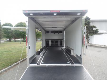 New EXAMPLE / NITRO BRAND 8.5X24 Enclosed Cast Corner Body Style Enclosed Car Trailer, with Options. Big Escape Door, Finished Interior, Cabinets, ID#009489