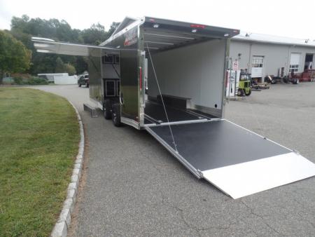 New EXAMPLE / NITRO BRAND 8.5X24 Enclosed Cast Corner Body Style Enclosed Car Trailer, with Options. Big Escape Door, Finished Interior, Cabinets, ID#009489