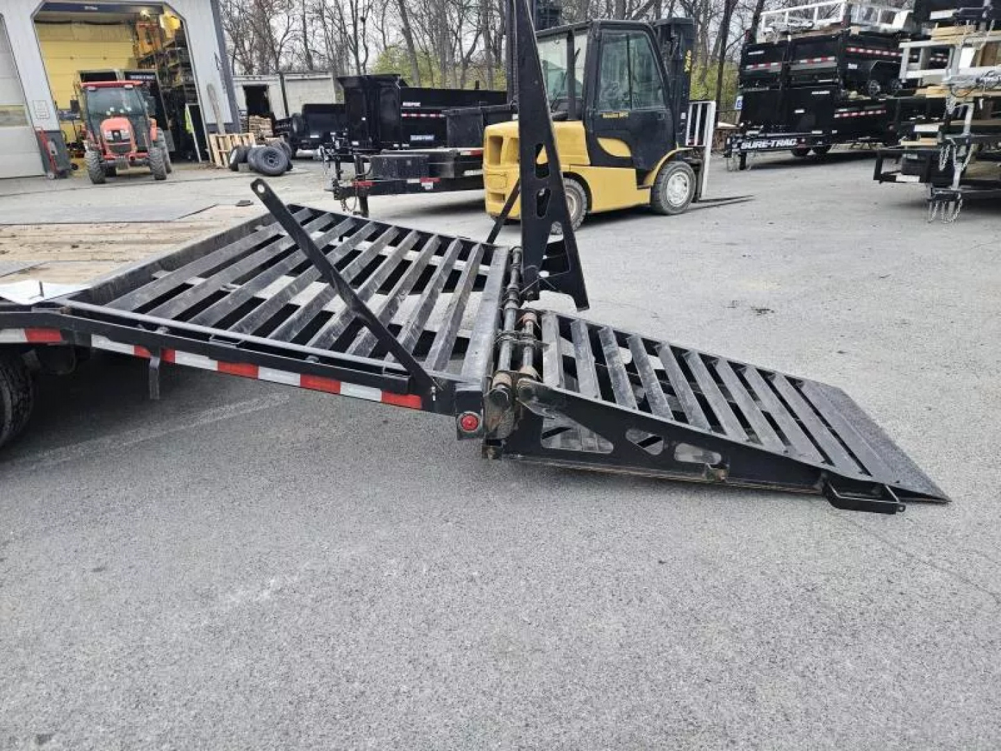 Used USED 2023 Ironbull 102x30' Pintle Beavertail Deckover Trailer 22000# GVW * RATCHET TRACK * DEXTER AXLES * HDSS SUSPENSION * FULL WIDTH RAMPAGE RAMPS * PIERCED FRAME * UNDER FRAME BRIDGE * MUD FLAPS * SPARE MOUNT
