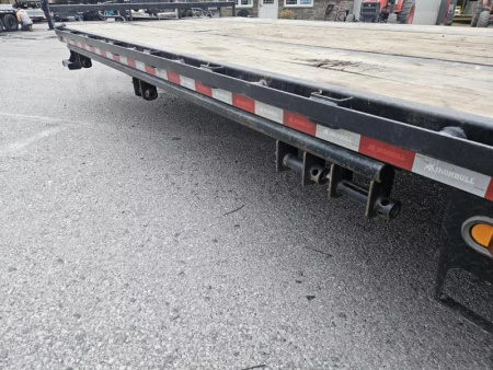 Used USED 2023 Ironbull 102x30' Pintle Beavertail Deckover Trailer 22000# GVW * RATCHET TRACK * DEXTER AXLES * HDSS SUSPENSION * FULL WIDTH RAMPAGE RAMPS * PIERCED FRAME * UNDER FRAME BRIDGE * MUD FLAPS * SPARE MOUNT