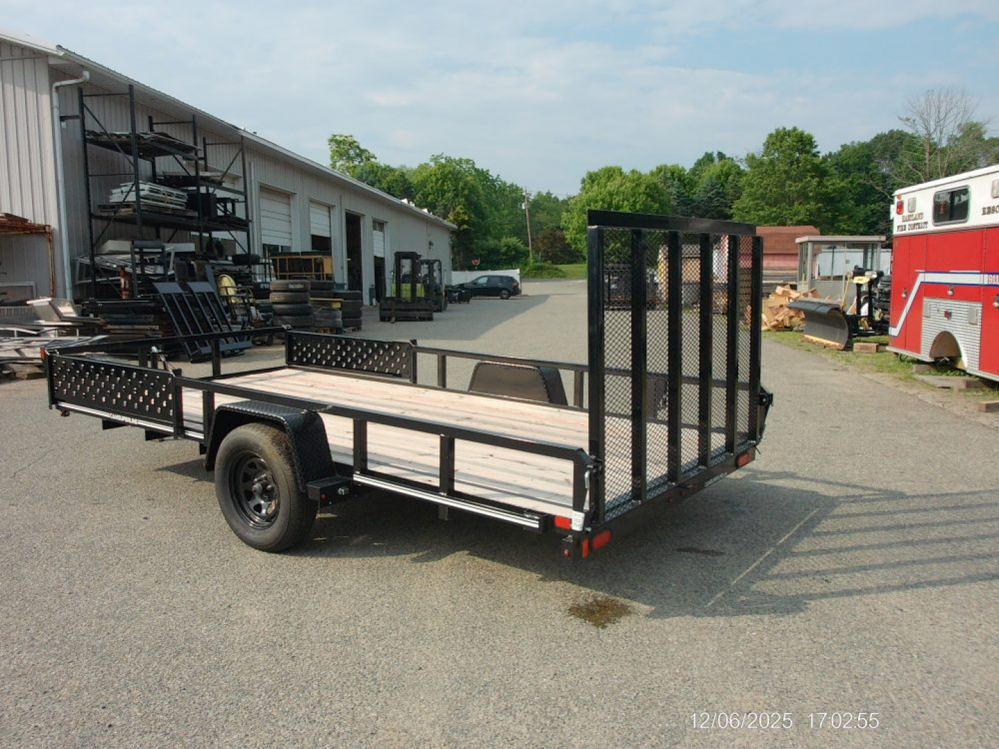 New EXAMPLE / TWO PLACE ATV / QUAD TRAILER, SIDE LOAD RAMPS, 81 wide by 14 ft. long deck. Single Axle, empty weight 1,450 lbs. ID#537100