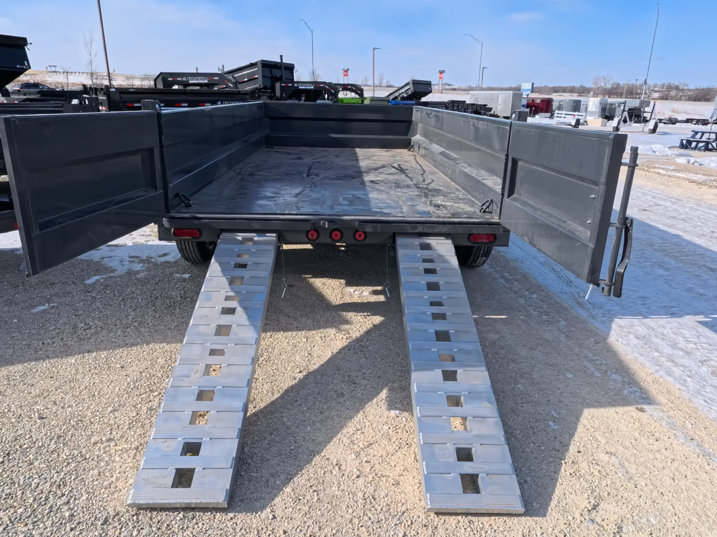 New 2026 Iron Bull 83 x 14 DWB Dump Trailer, 14,999lb. GVWR, Aluminum Ramps, Grey