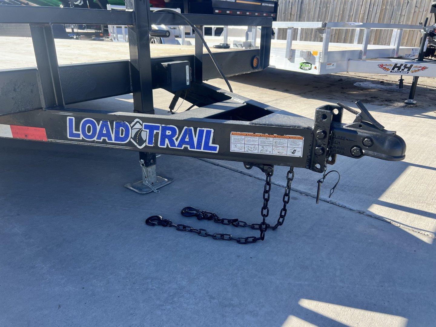 Used 2021 Load Trail 20’ flatbed Trailer 2-5200 lb axles=10K, dovetail, removable fenders, Slide In Ramps