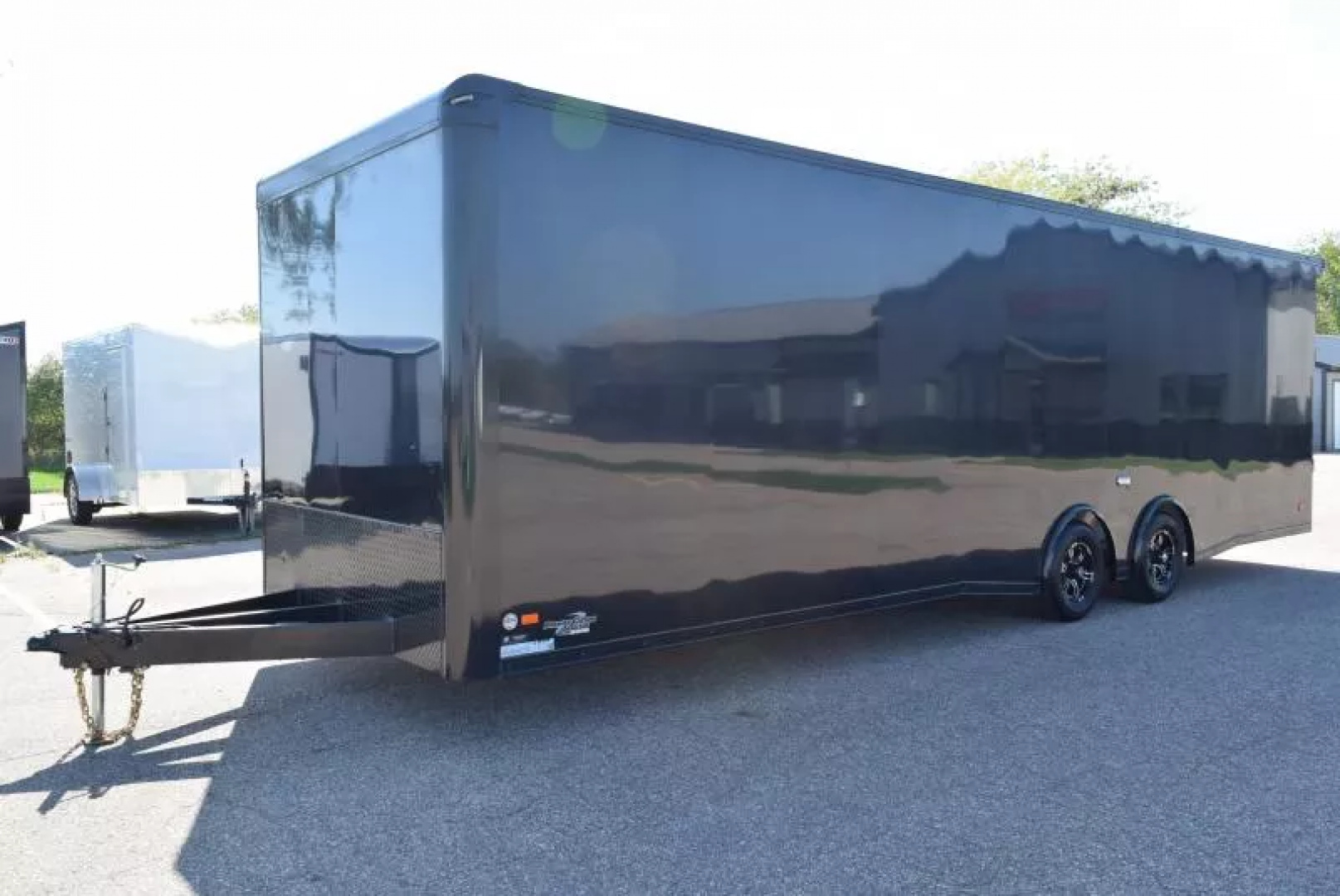 Used PRE-OWNED 2023 BRAVO 8.5x28 SILVER STAR ALUMINUM ENCLOSED CAR HAULER