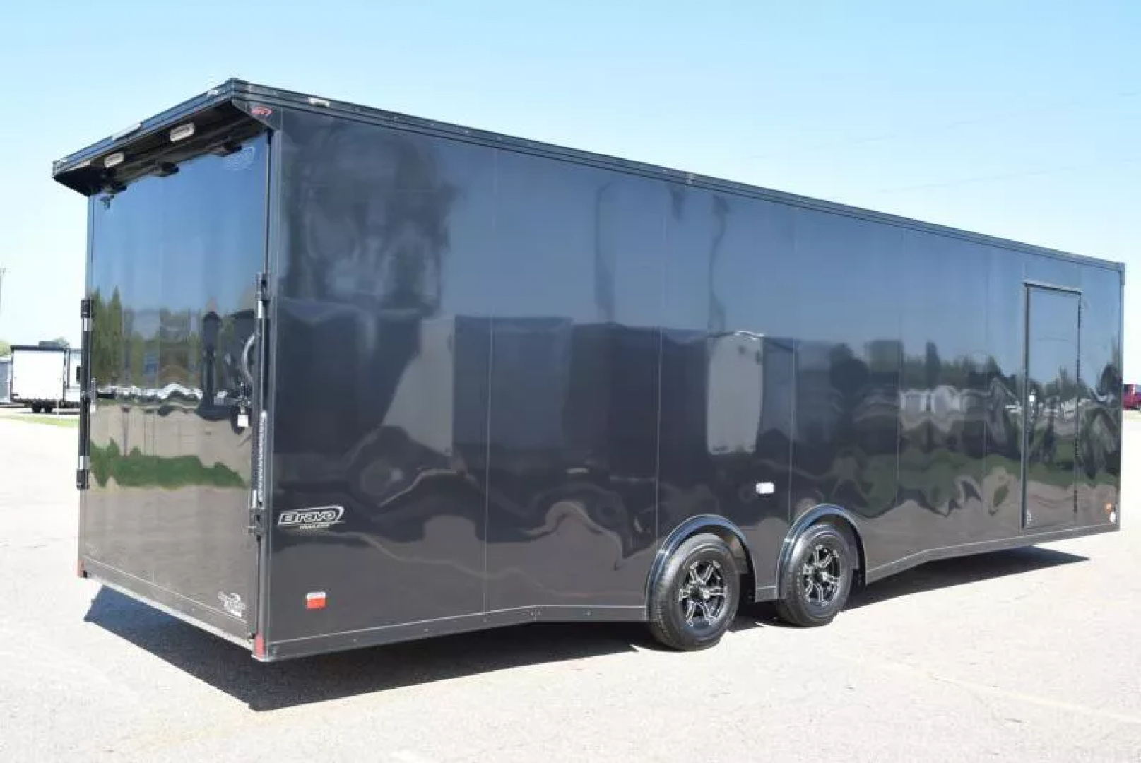 Used PRE-OWNED 2023 BRAVO 8.5x28 SILVER STAR ALUMINUM ENCLOSED CAR HAULER