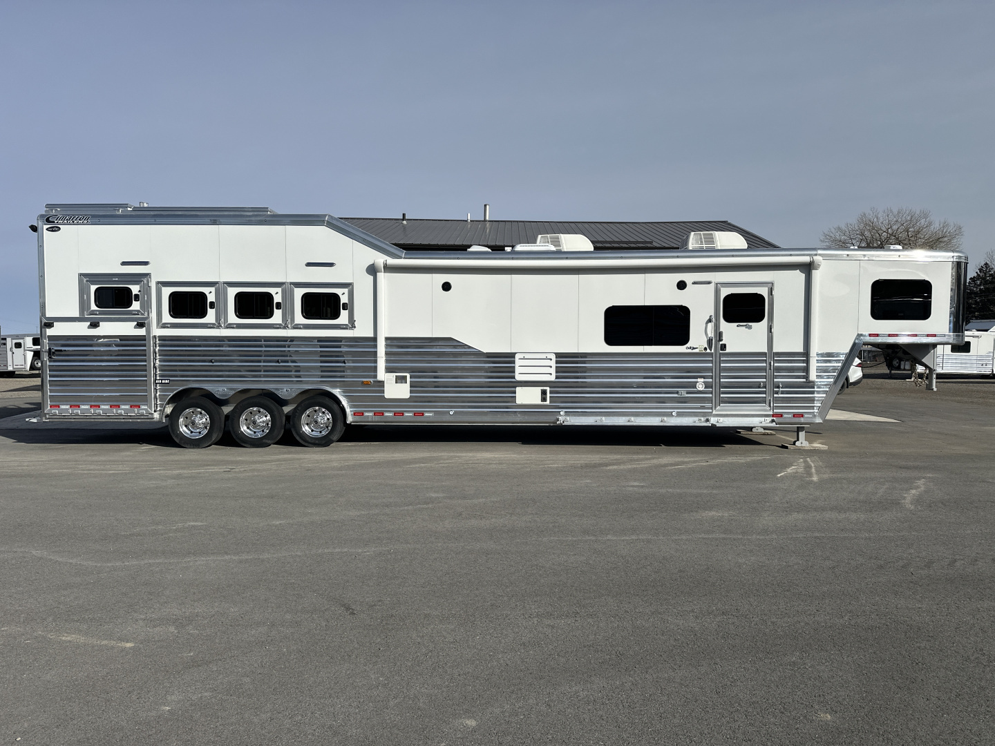 New 2026 Cimarron 4 Horse Side Load with 17'9" Living Quarter by Outlaw Conversions