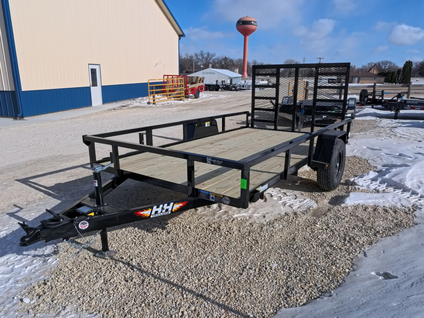 New 2026 H&H 76 x 12 Rail Side Utility Trailer with 5K GVWR, Brakes and Upgraded with a Spring Assist 4 Ft. Tall Ladder Style Gate