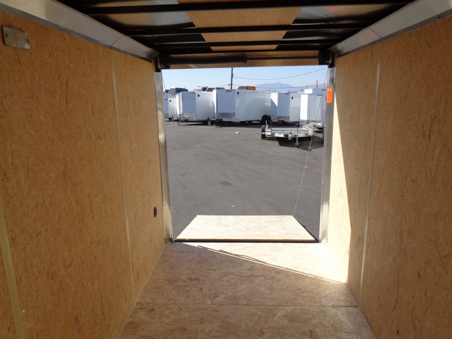 New 2026 Pace American - Out Back DLX - 6x10 V-Nose Tandem Axle 7k Cargo Trailer w/ Rear Ramp Door