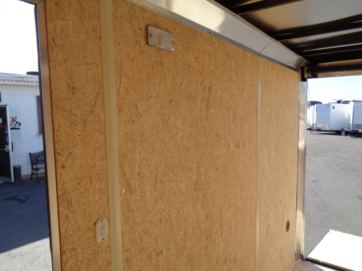 New 2026 Pace American - Out Back DLX - 6x10 V-Nose Tandem Axle 7k Cargo Trailer w/ Rear Ramp Door