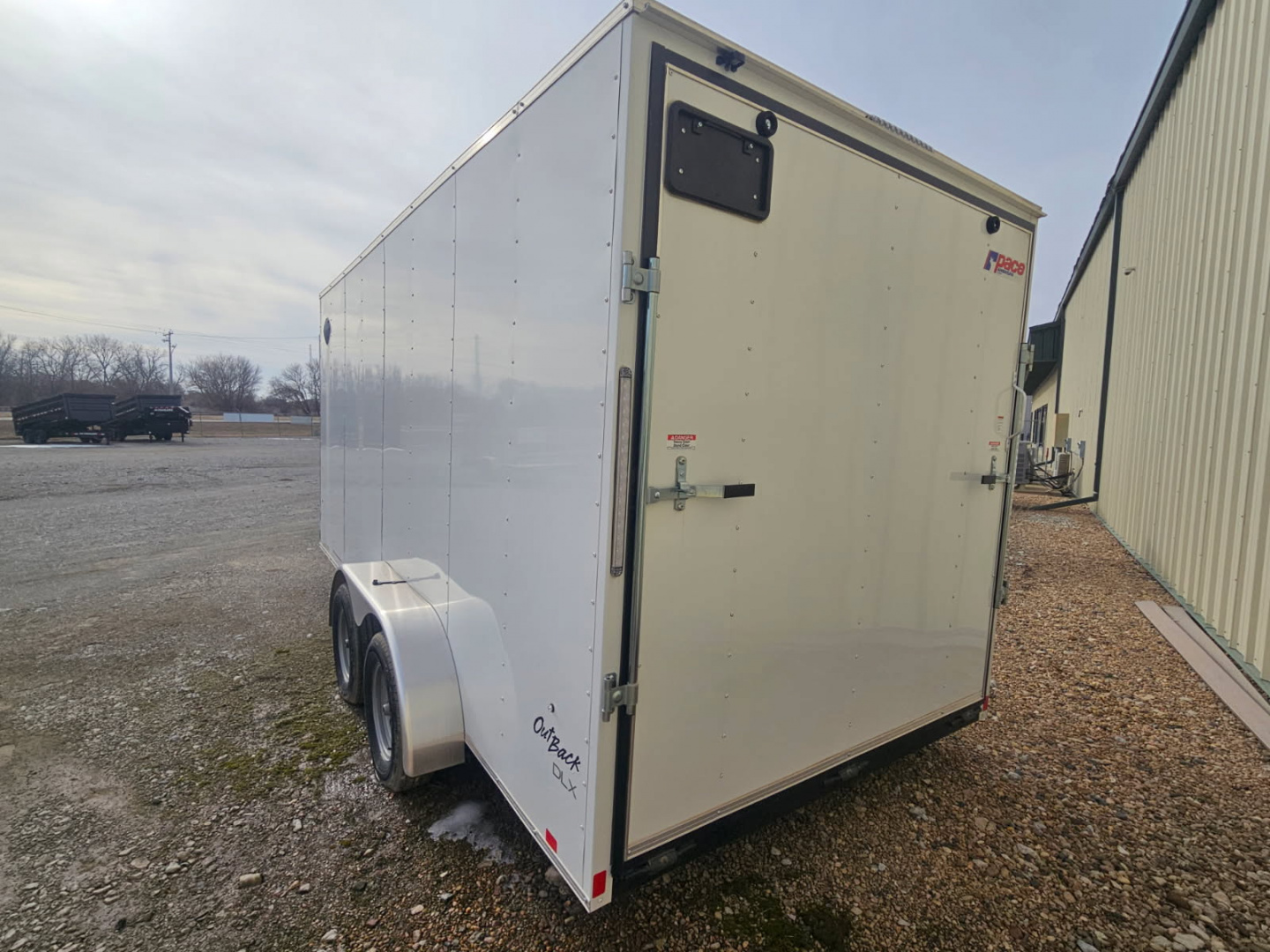 New 2024 Pace American OUTBACK DLX Cargo / Enclosed Trailer
