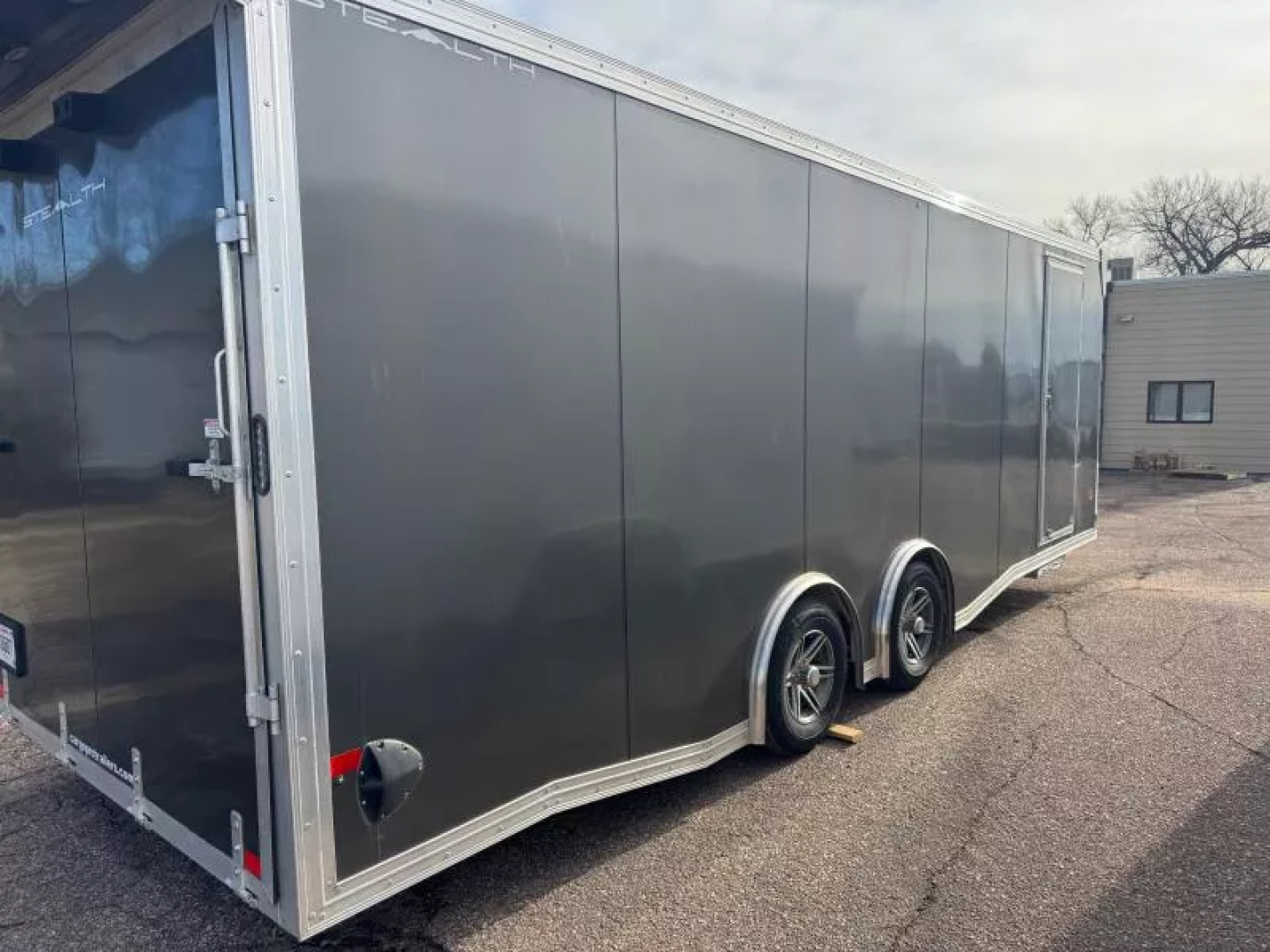 Used 2023 Alcom-Stealth 8.5 x 24 Aluminum Frame Premium Enclosed Trailer Car Trailer / Cargo Trailer