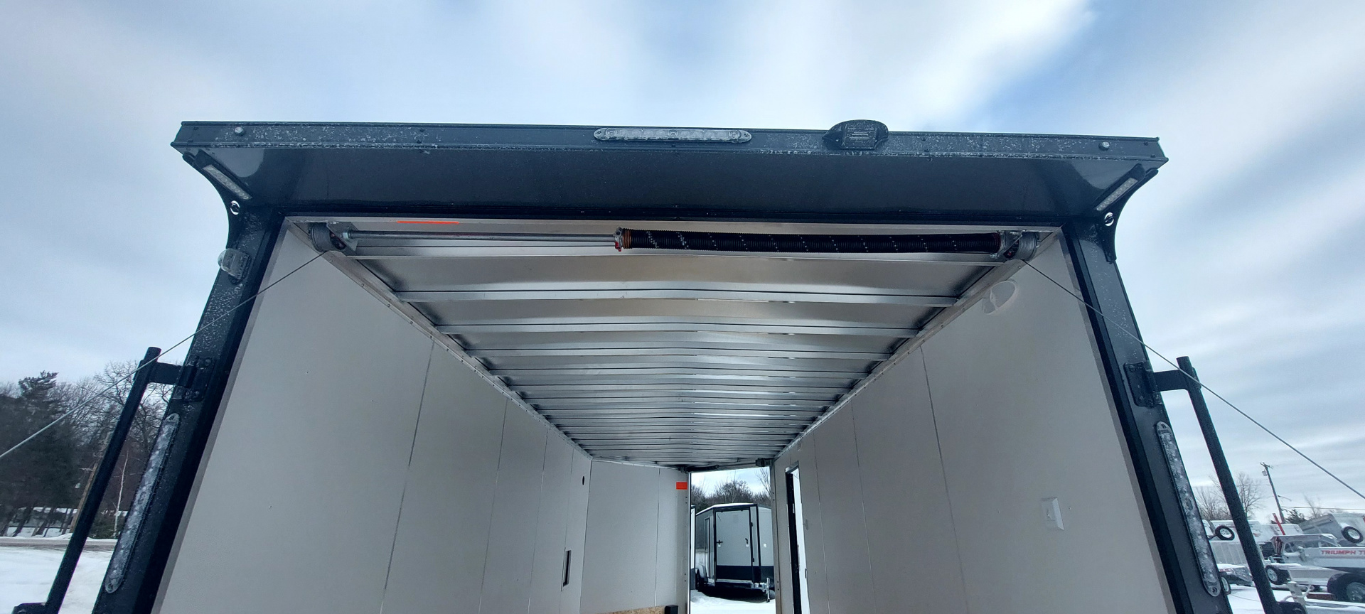 New 8 X 20 + 4' V-NOSE ENCLOSED SNOWMOBILE/CAR HAULER 5200# AXLES ALL ALUMINUM POLYCOMPOSITE EXTERIOR LIGHTNING