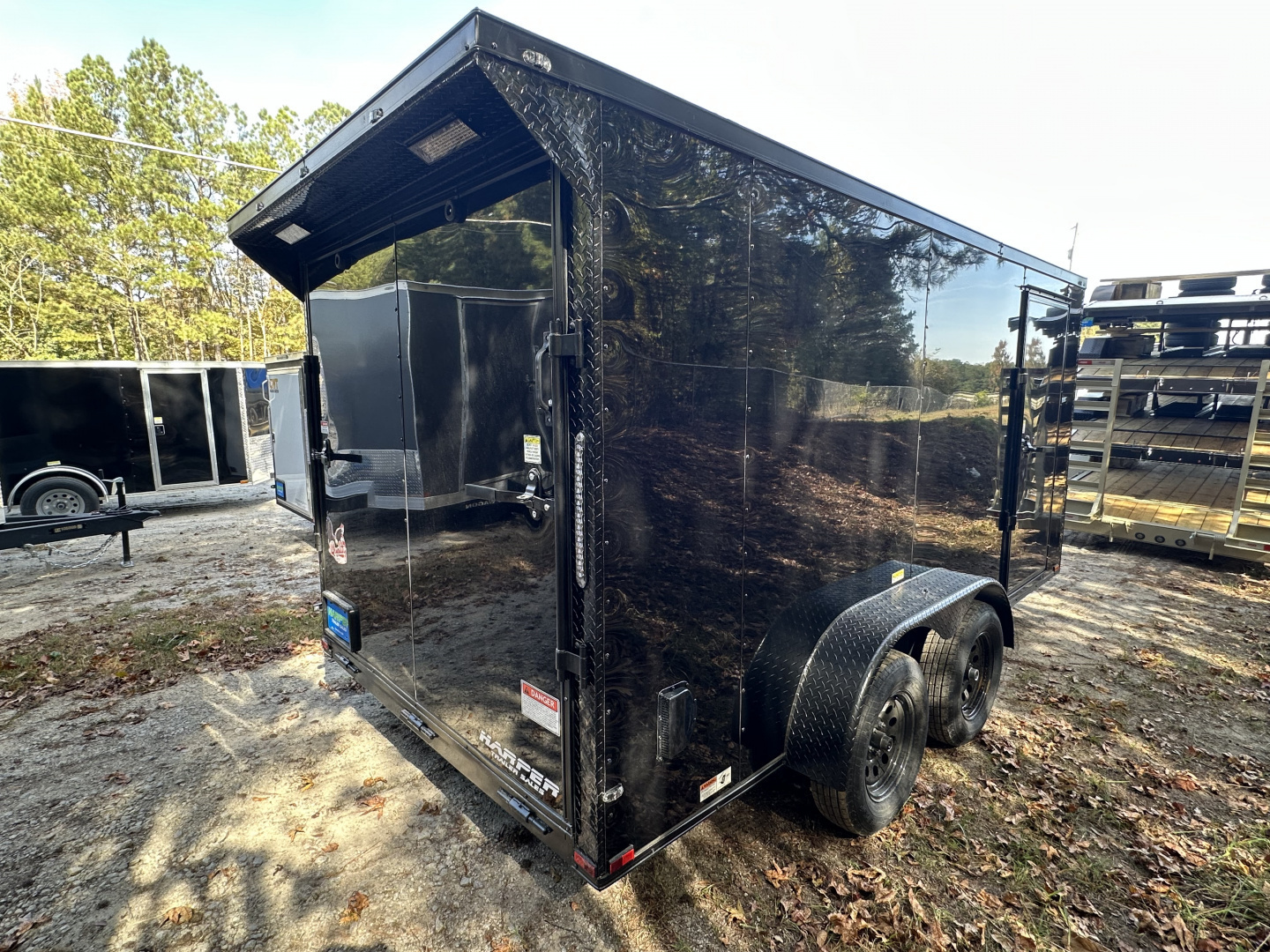 New 2026 QUALITY CARGO 7X14 TANDEM AXLE ENCLOSED TRAILER WITH REAR SPOILER AND BLACKOUT PACKAGE