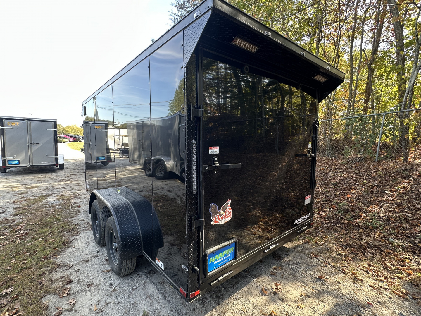 New 2026 QUALITY CARGO 7X14 TANDEM AXLE ENCLOSED TRAILER WITH REAR SPOILER AND BLACKOUT PACKAGE