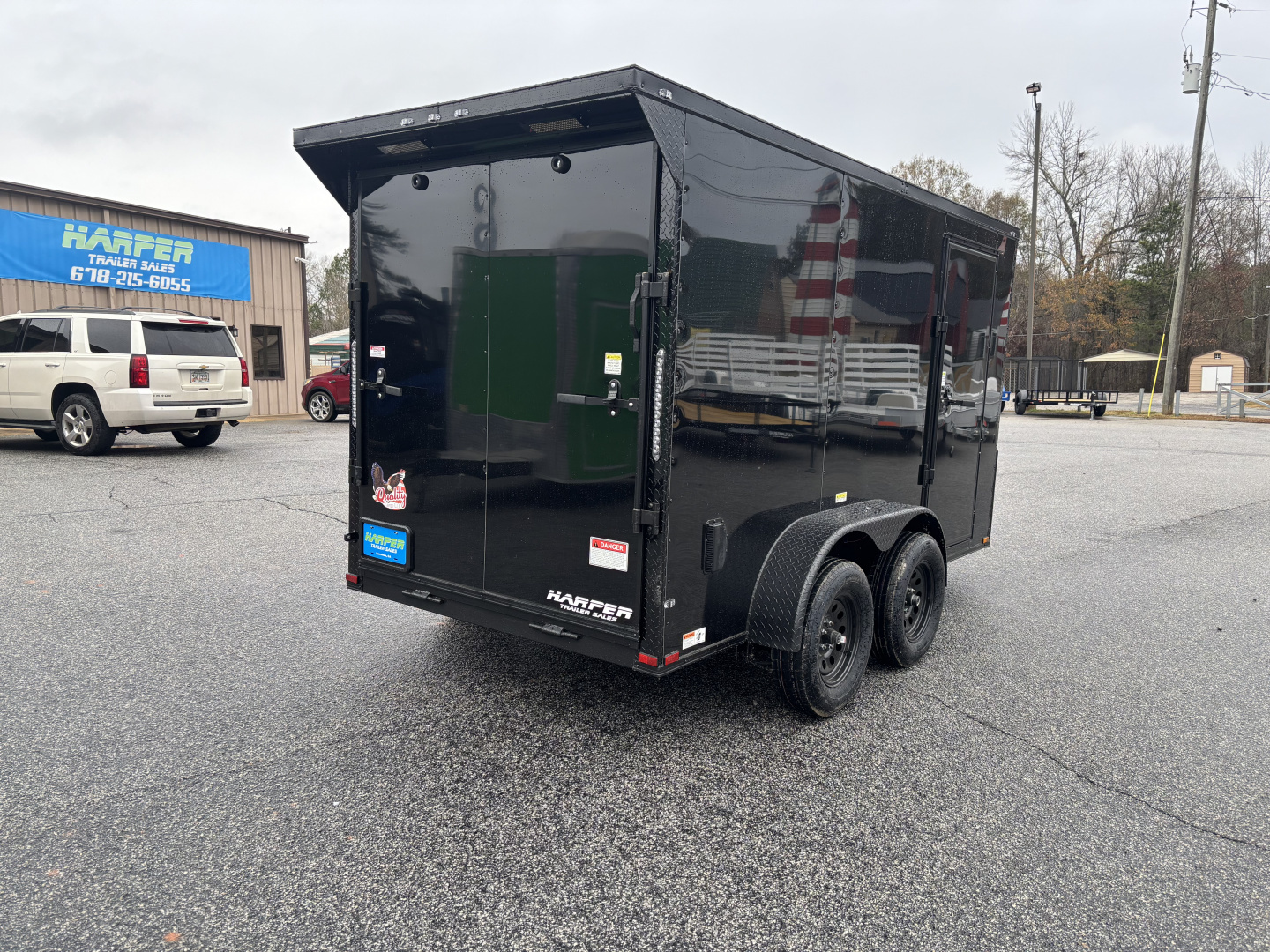 New 2026 QUALITY CARGO 6X12 TANDEM AXLE ENCLOSED TRAILER WITH REAR SPOILER AND POLYCORE EXTERIOR