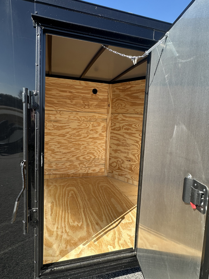 New 2026 7X16 QUALITY CARGO TANDEM AXLE ENCLOSED TRAILER WITH REAR SPOILER AND BLACKOUT PACKAGE