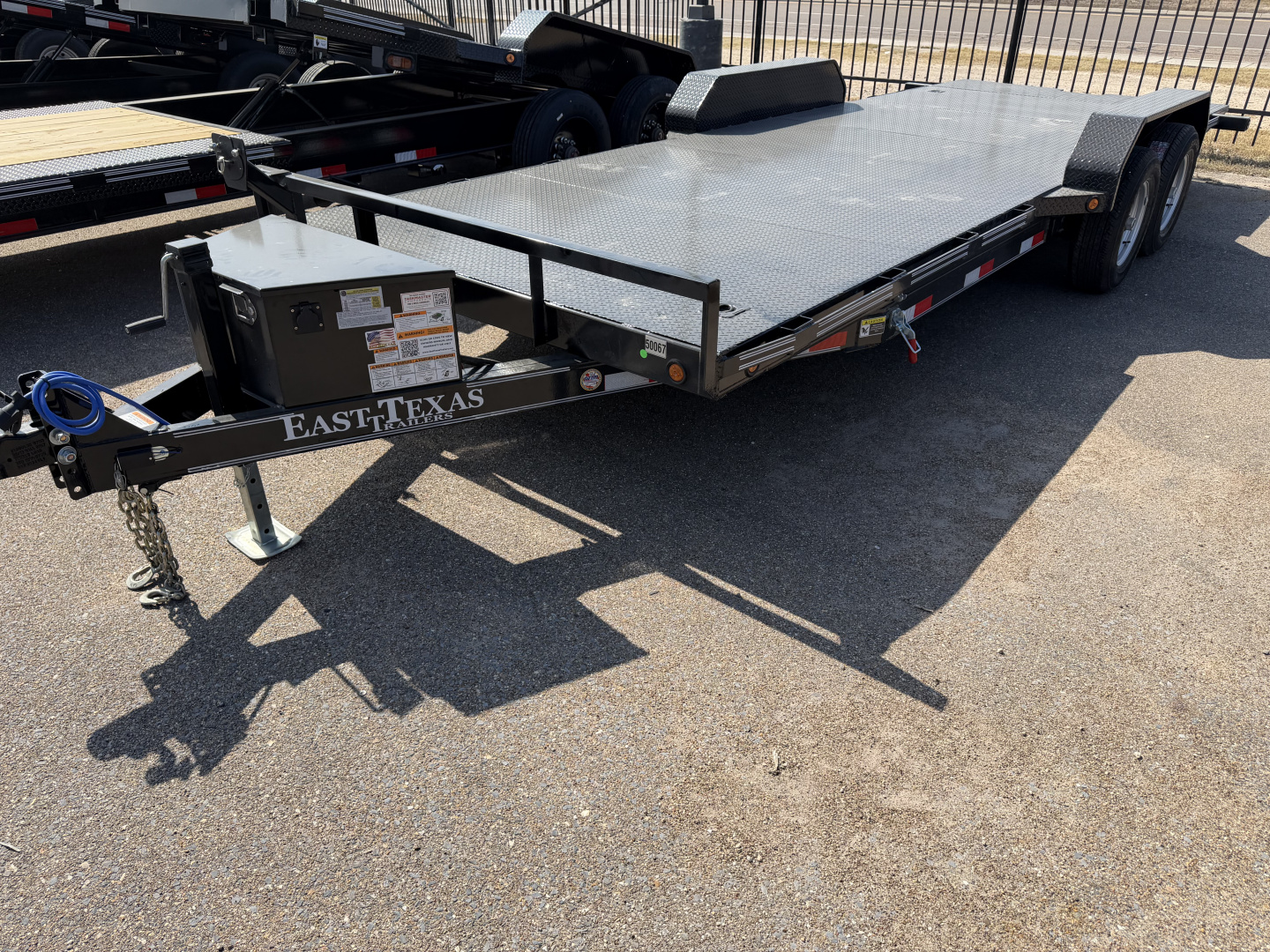 New 2026 East Texas Trailers 83x20ft Tilt Car Hauler 10k