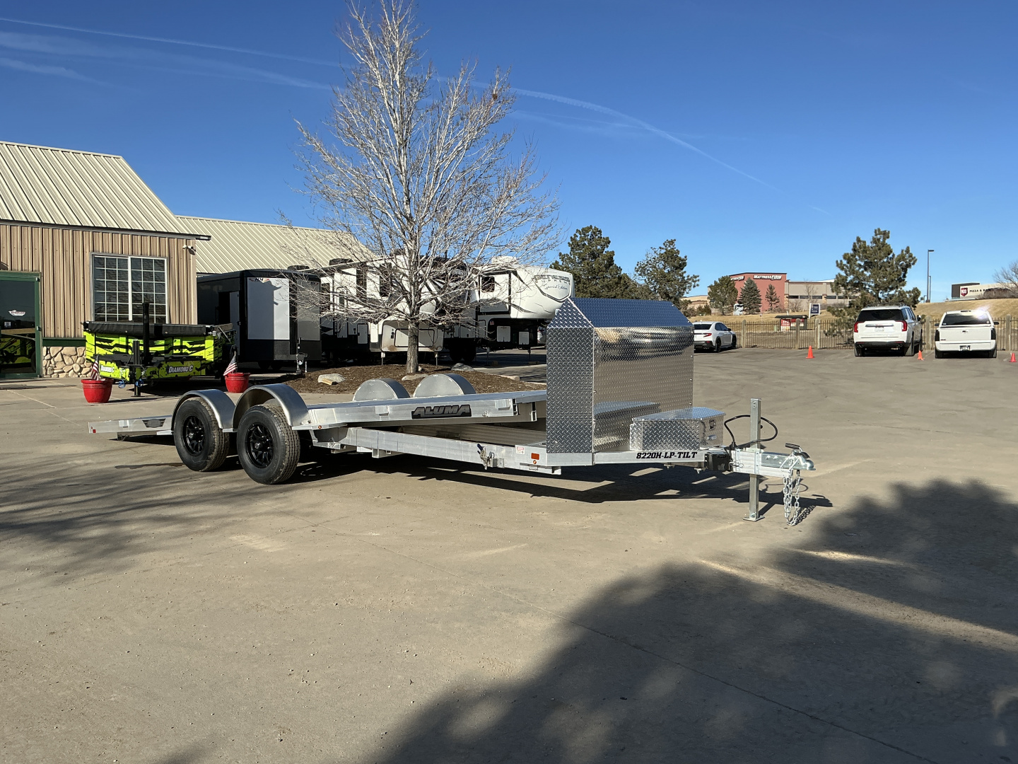 New 2026 Aluma 8220H-LP-TILT-TA-EL-R-RTD Flatbed Trailer