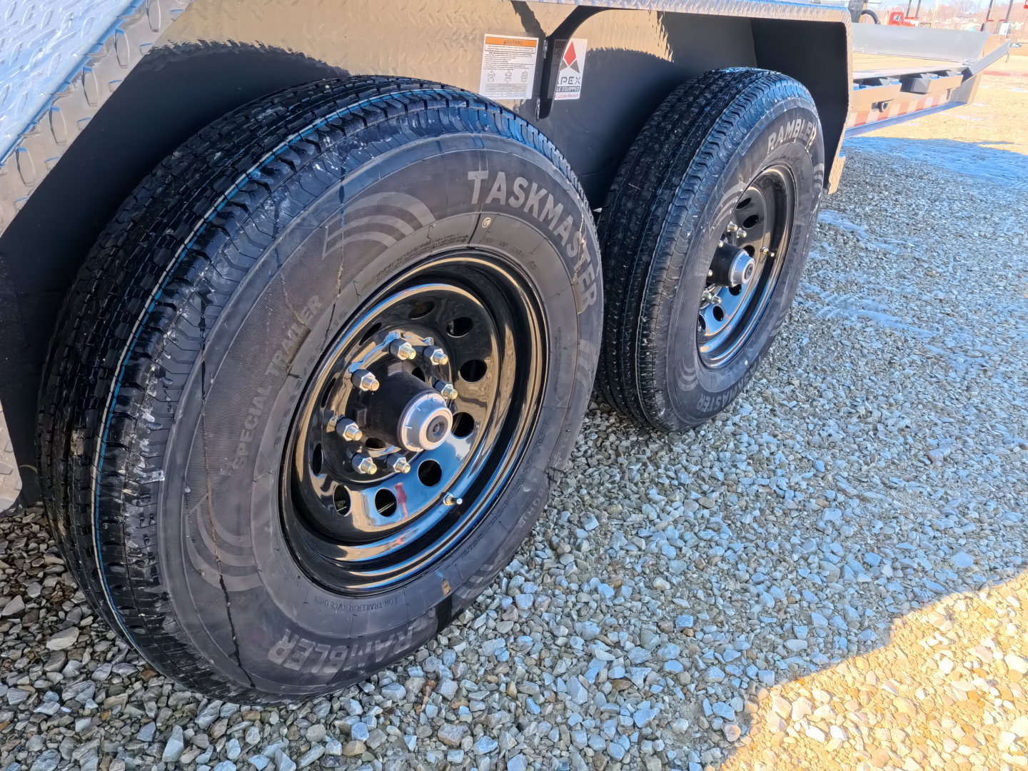 New 2026 Iron Bull 83 x 22 EWB Equipment Trailer with 14,000 lb. GVWR & Rampage Ramps in Ranch Gray