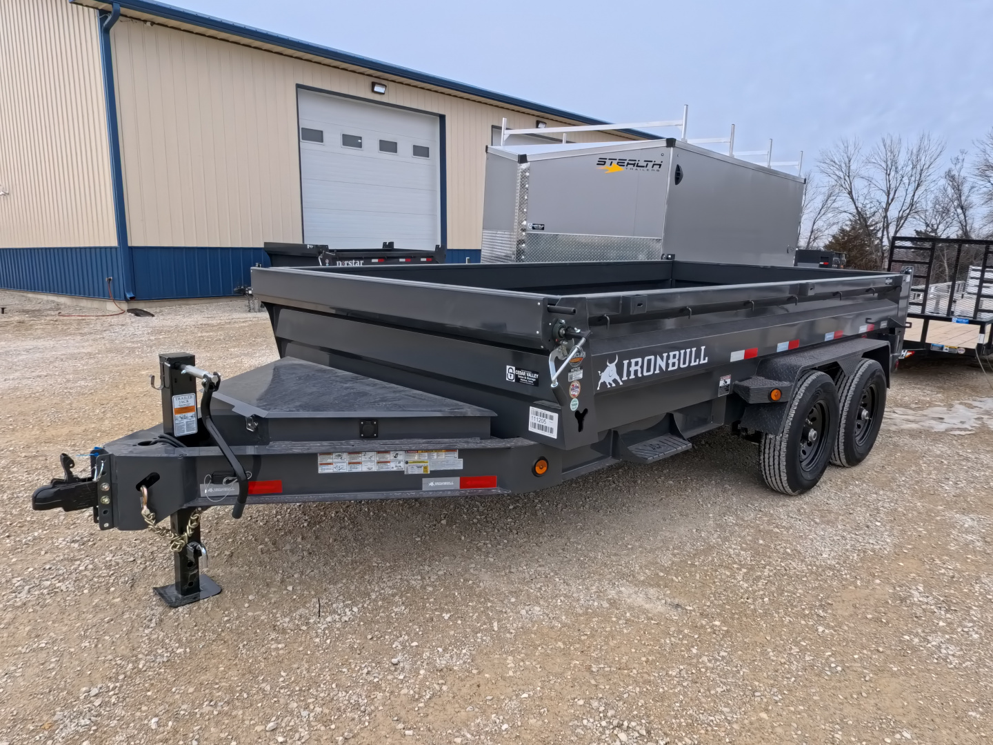 New 2026 Iron Bull 83 x 14 DWB Dump Trailer, 14,999lb. GVWR, Aluminum Ramps, Grey