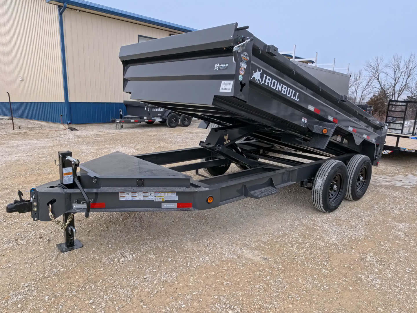 New 2026 Iron Bull 83 x 14 DWB Dump Trailer, 14,999lb. GVWR, Aluminum Ramps, Grey