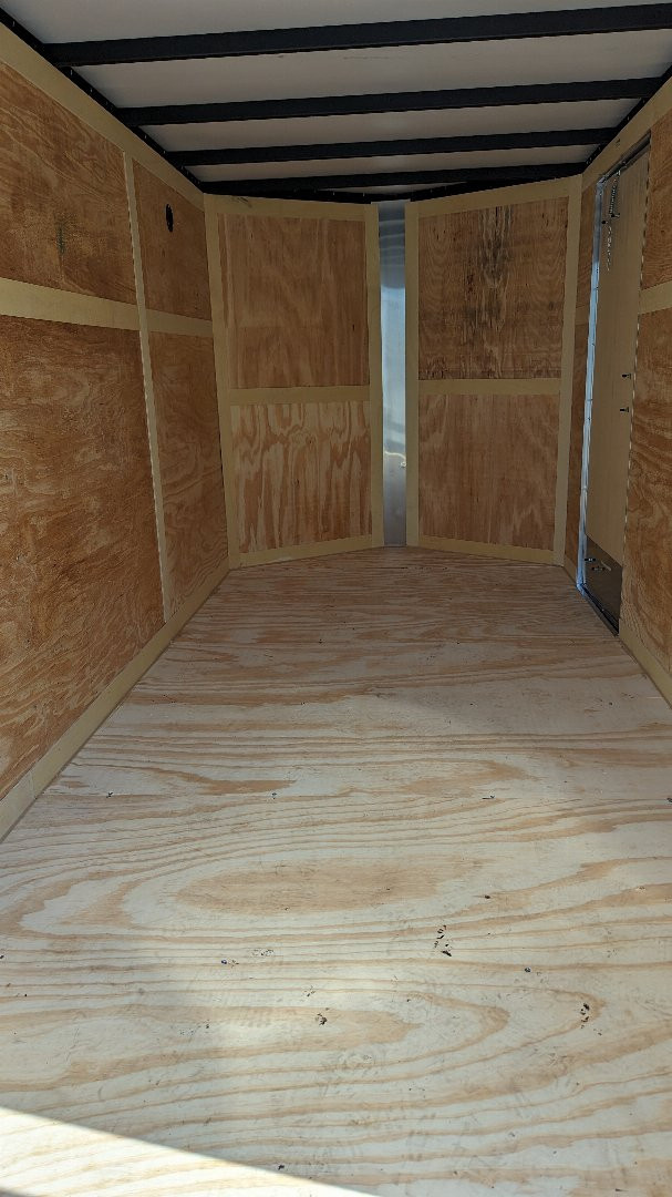 New 2026 Homesteader 6x10 Intrepid V-Nose Cargo Trailer w/ Barn Doors