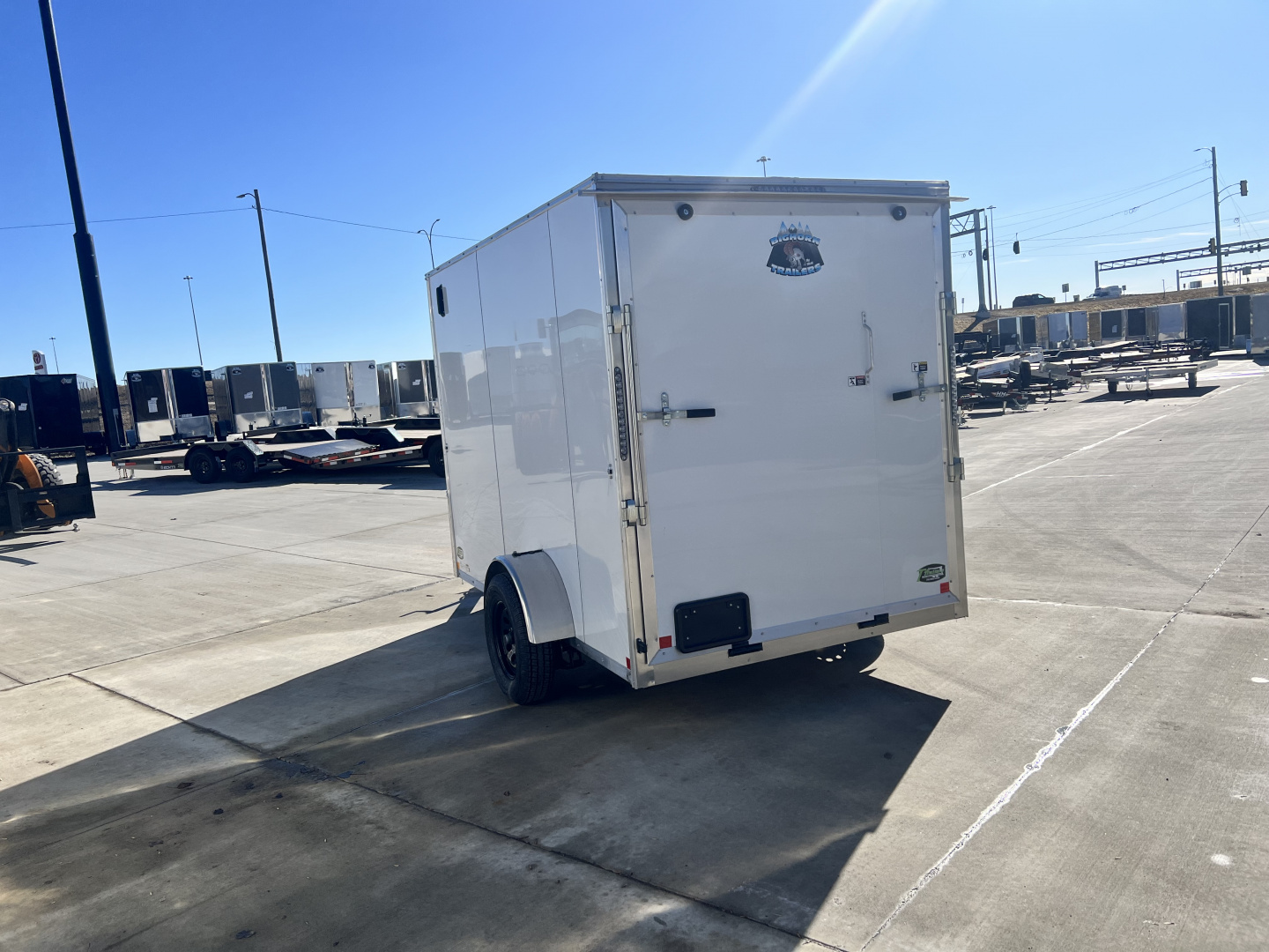 New 2026 Bighorn R&M 6x10+ 2V 6 inches Taller 78” Enclosed Rear Ramp Cargo Trailer