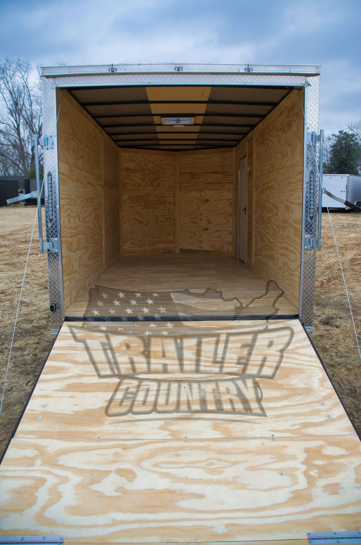 New 2026 New 7 X 14 Tandem Axle, V-Nosed Enclosed Motorcycle Cargo Trailer.