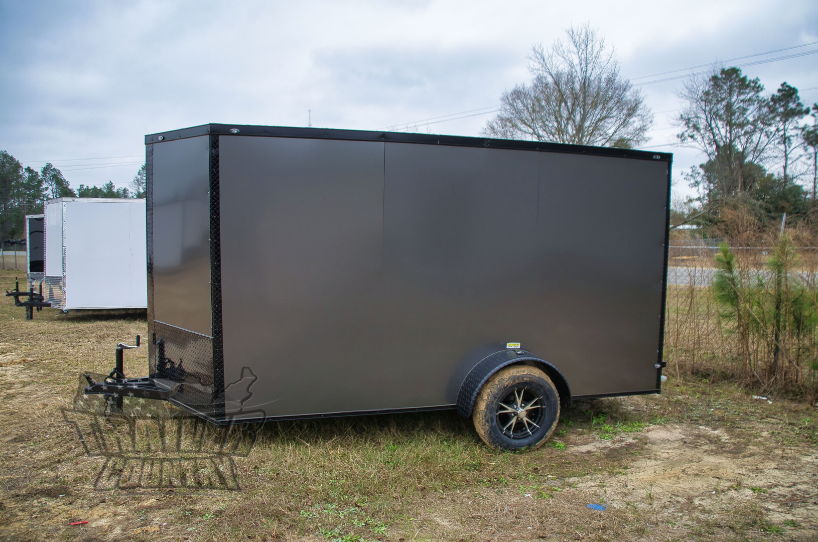 New 2026 NEW Model 6 X 12 Single Axle, V-Nosed Enclosed Blacked Out Motorcycle Cargo Trailer