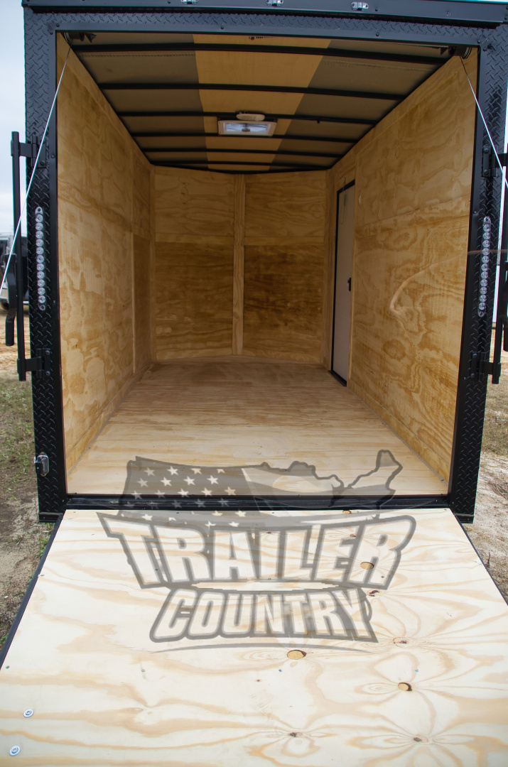 New 2026 NEW Model 6 X 12 Single Axle, V-Nosed Enclosed Blacked Out Motorcycle Cargo Trailer