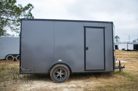 New 2026 NEW Model 6 X 12 Single Axle, V-Nosed Enclosed Blacked Out Motorcycle Cargo Trailer