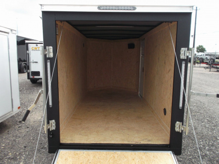 New 2026 Covered Wagon Trailers 5x10 Cargo / Enclosed Cargo Trailer / Ramp / RV Side Door / Bed Lined Tongue and Frame / .030 Black