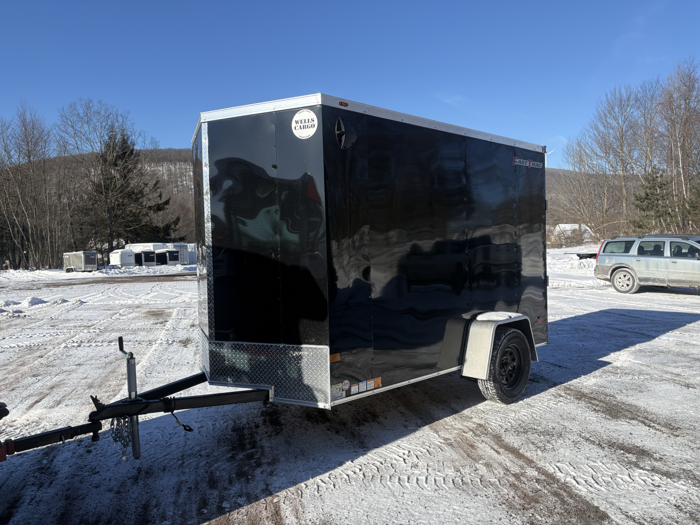 New 2026 WELLS CARGO 6x10 6'6" Interior Height Fasttrac Deluxe Cargo / Enclosed Trailer w/Ramp Door