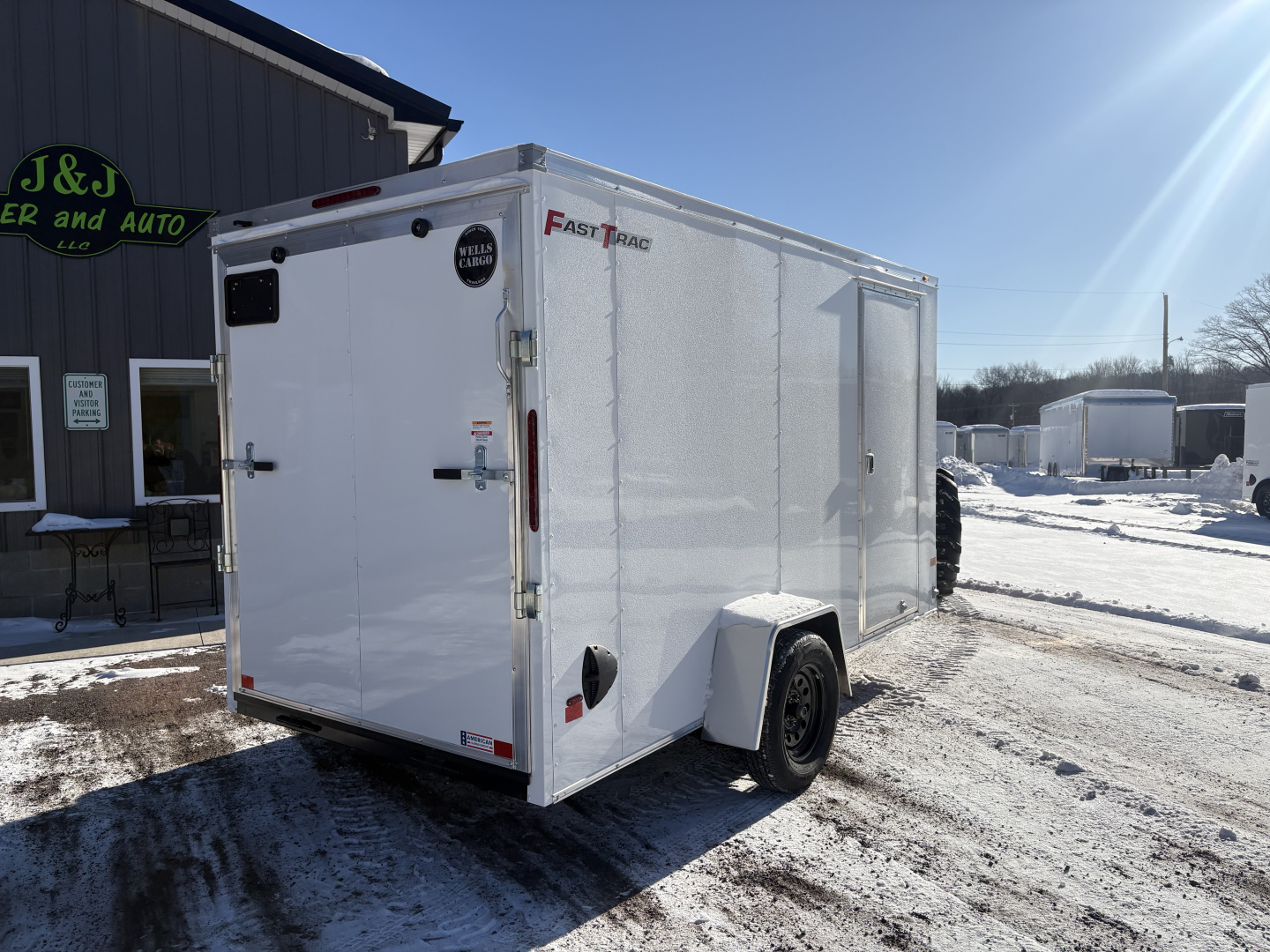 New 2026 Wells Cargo 6x12 6'6" Interior Height Fasttrac Deluxe Cargo / Enclosed Trailer w/Ramp Door